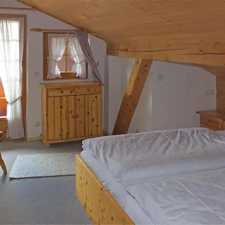 In With Balcony And A View Of The Alps